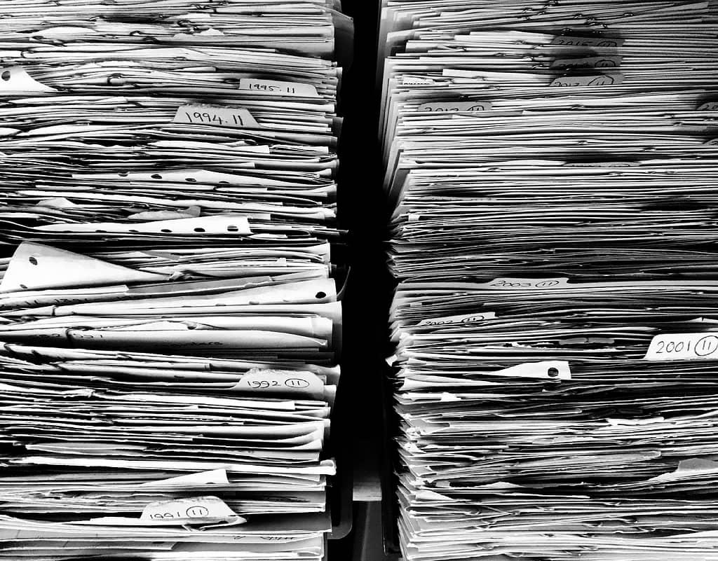piles of disorganizing files representing loss mitigation applications